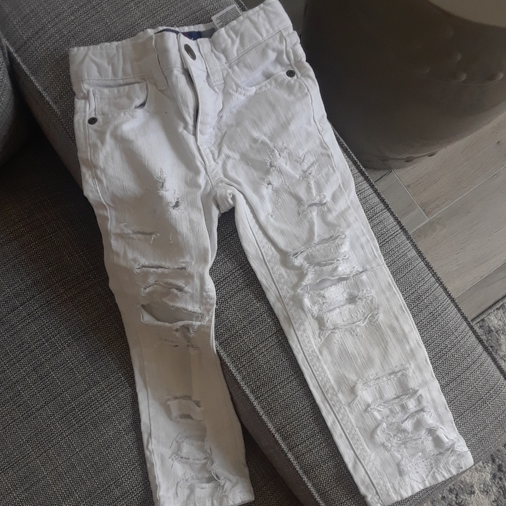 Distressed denim jeans